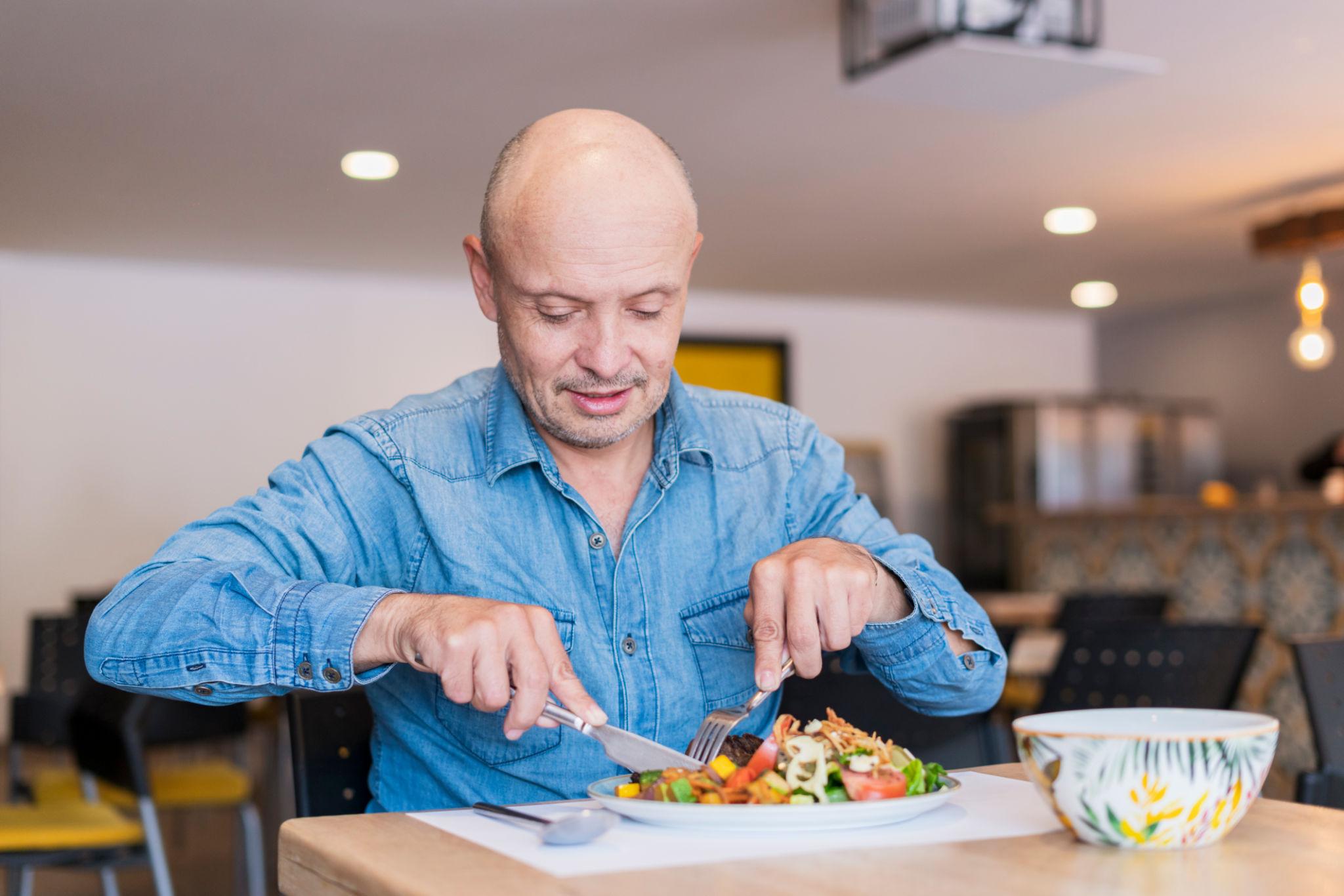 Person cooking in a kitchen
